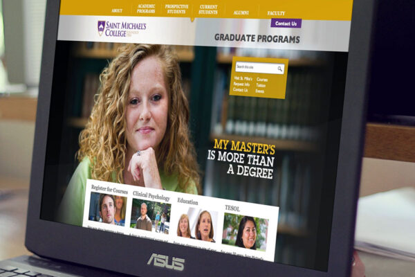 Laptop displaying Saint Michael's College website