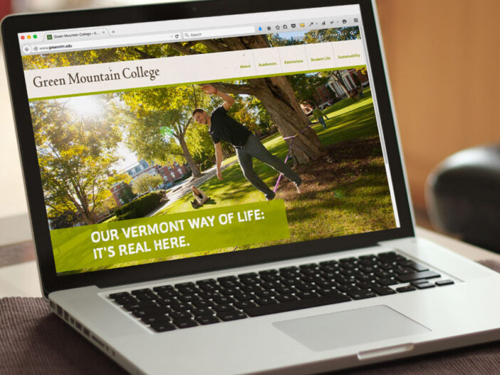 Green Mountain College website displayed on laptop
