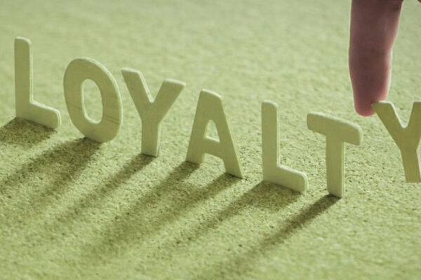 Closeup of small letters spelling loyalty