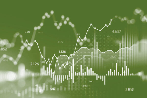 A green photo illustration showing digital trend graphs and bar charts.