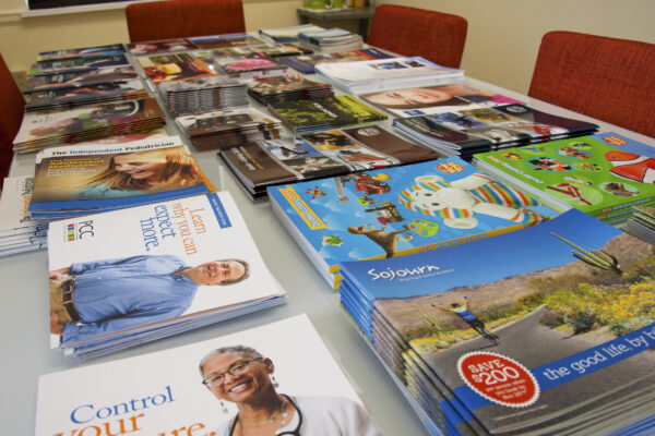 Array of Stride printed materials on table
