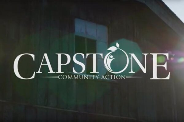 Opening screen of Capstone's overview video - the Capstone logo with an old barn in the background