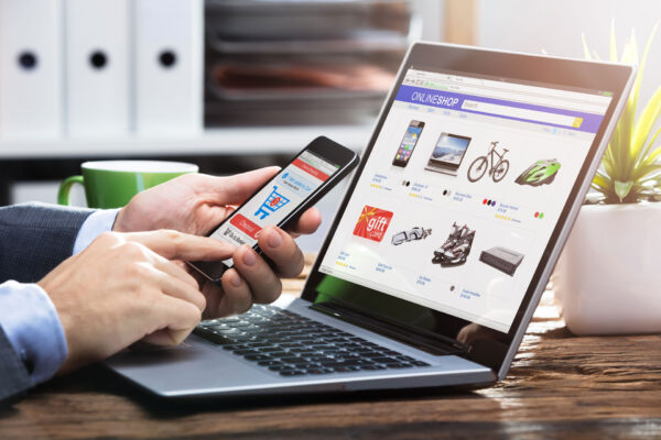 person shopping online with their laptop