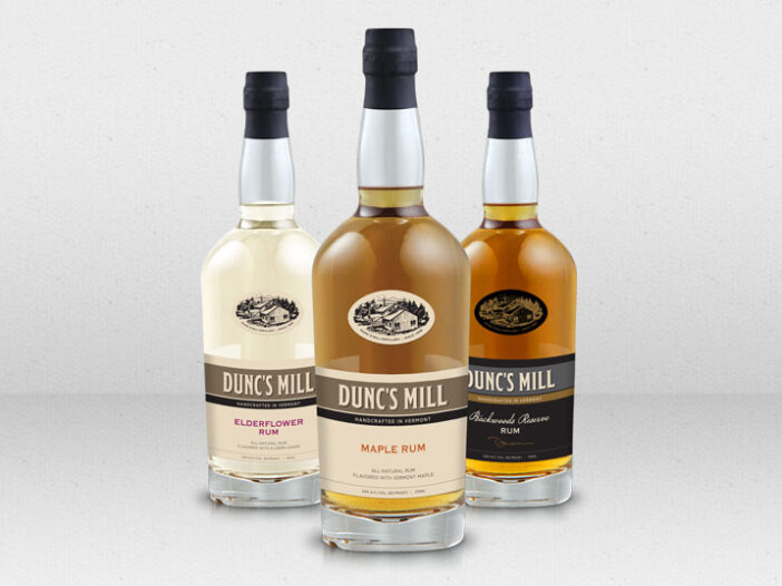 3 Dunc's mill rum bottles and labels
