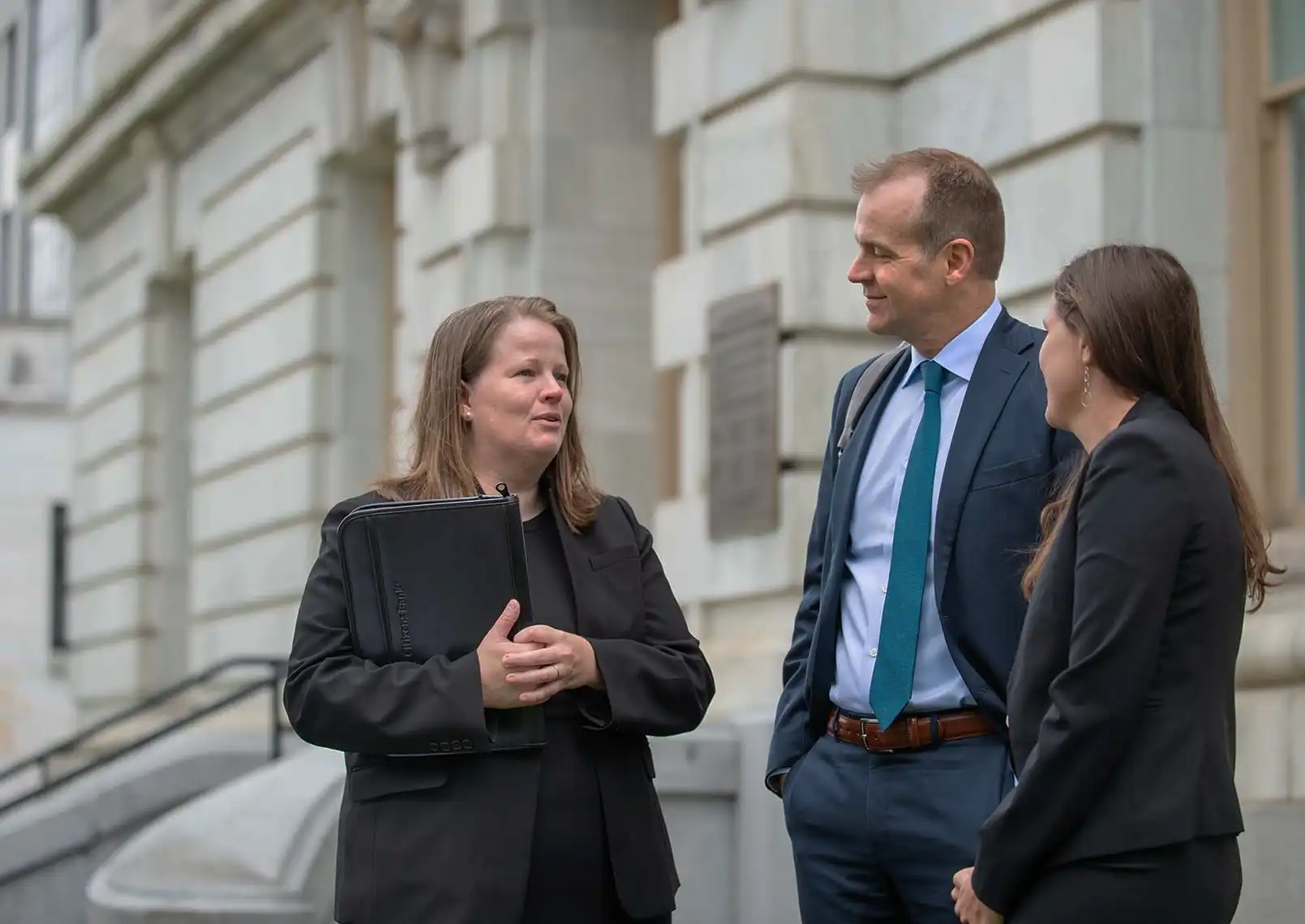 lawyers in front of courthouse