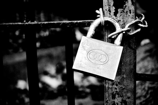 Lock on gate black and white