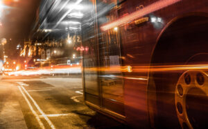 Long exposure photo of double decker bus at night