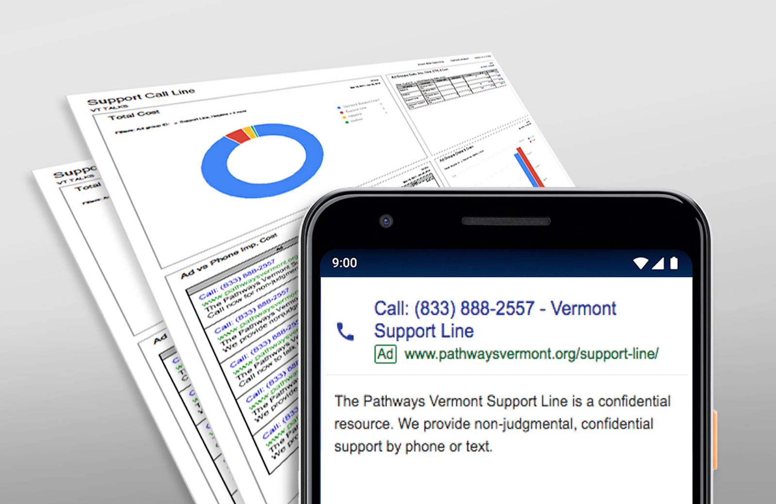 Phone showing Vermont Support Line, paper with graphs and text in background