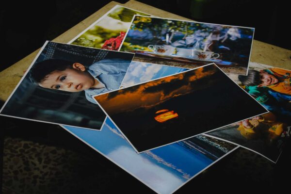printed photos laid out onto table