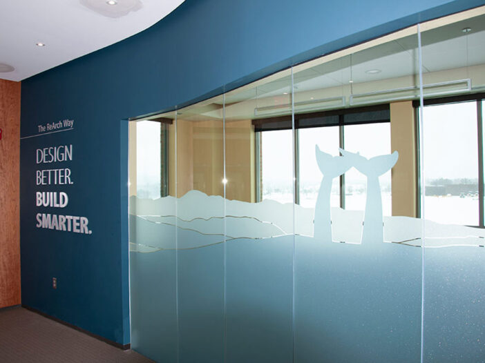 ReArch Company, whales tales design on a glass screen