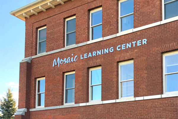 Mosaic Learning Center Exterior Signage on brick building