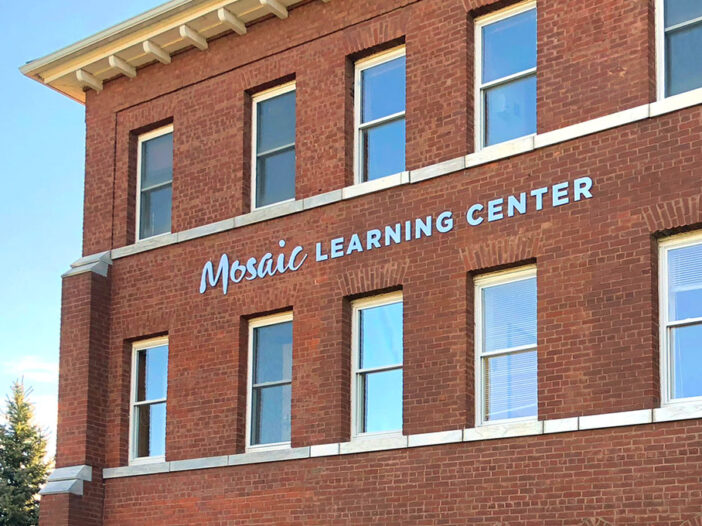 Mosaic Learning Center Exterior Signage on brick building