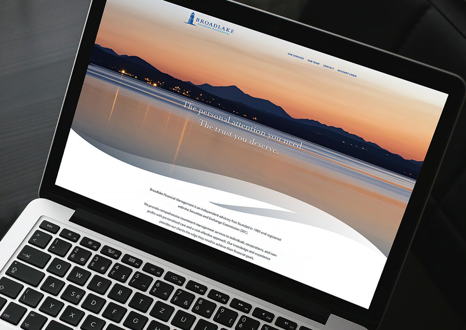 Broadlake Financial Management website displayed on laptop